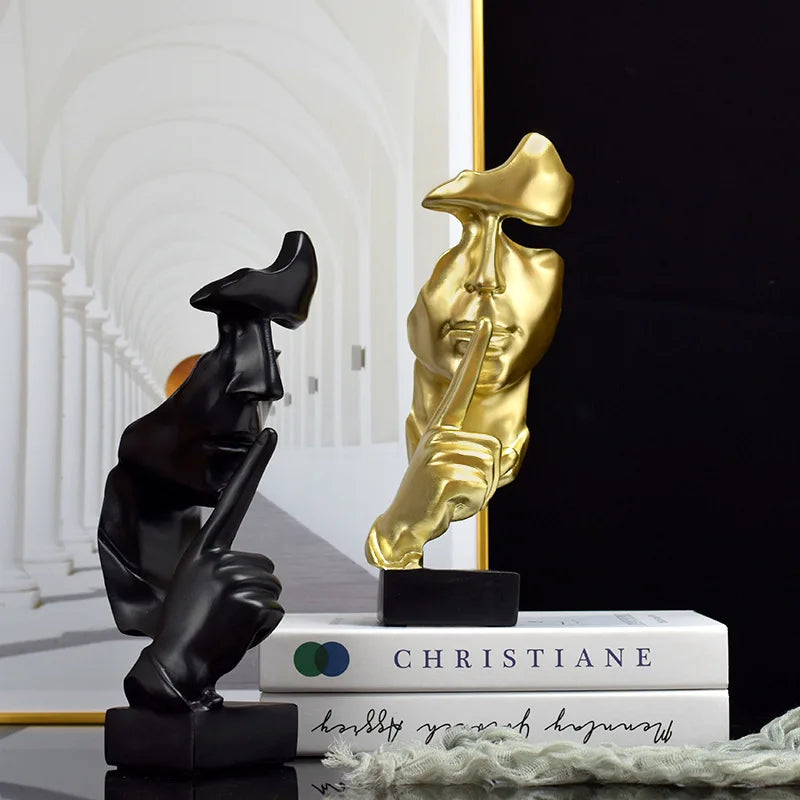 Escultura da estátua do pensador O silêncio é ouro
